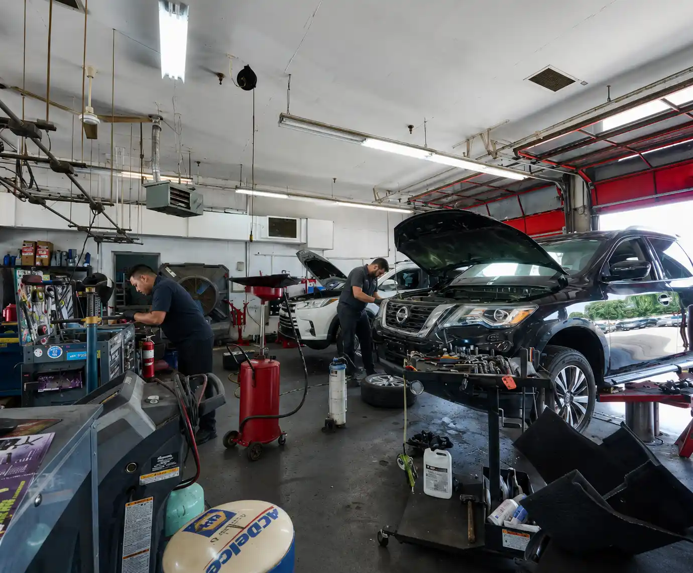mechanics-working-tire-shop-custer-rd-plano-tx